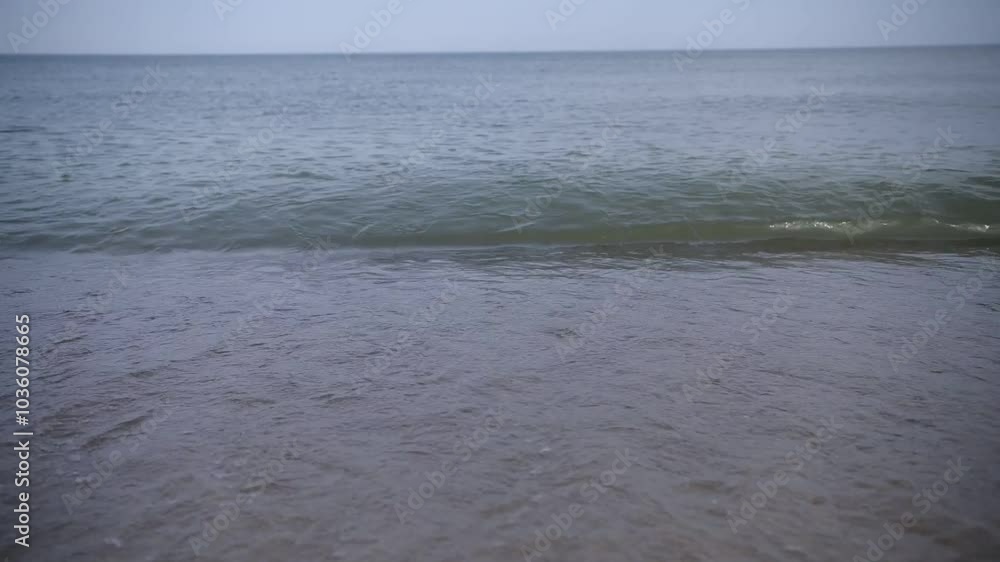 The waves of the sea are beating against the shore The waves of the sea are beating against the shore