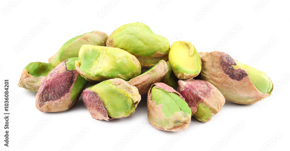 Tasty peeled pistachio nuts isolated on white Tasty peeled pistachio nuts isolated on white