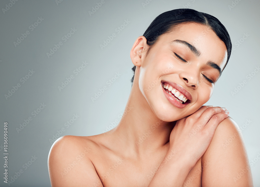 Skincare, cosmetics and woman with smile, shine and dermatology on gray studio background. Person, girl and model with happiness, grooming routine and treatment for smooth skin, glow and aesthetic Skincare, cosmetics and woman with smile, shine and dermatology on gray studio background. Person, girl and model with happiness, grooming routine and treatment for smooth skin, glow and aesthetic