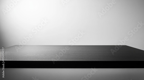 Empty black tabletop on a white background perfect for showcasing products High quality image