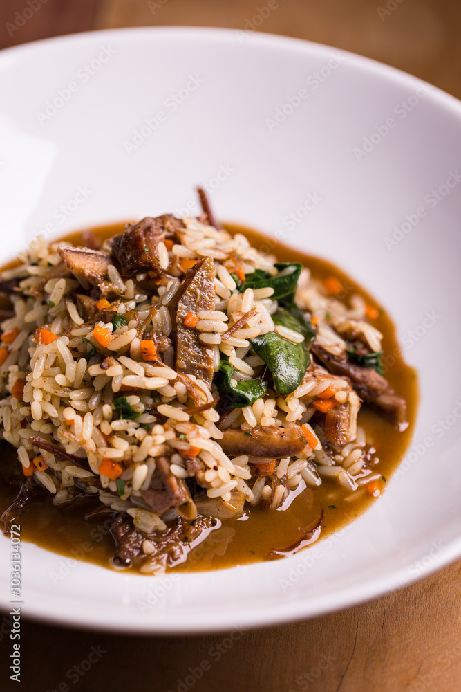 Delicious Beef Rice Medley with Vegetables in a White Bowl