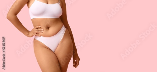 Canvastavla Beautiful young body positive woman on pink background