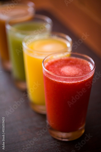 Wallpaper Mural Colorful Array of Fresh Fruit Juices in Glasses on Display Torontodigital.ca