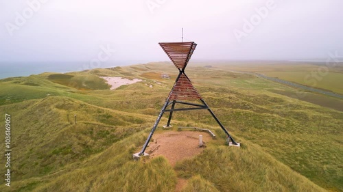 Drone shot of unlighted beacon seamark in the dunes of Husby Klit, on the west coast of Jutland,  Denmark