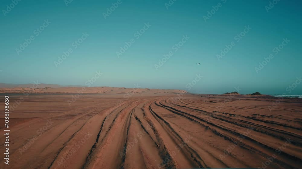 Car driving through vast Namib Naukluft National Park, Namibia Car driving through vast Namib Naukluft National Park, Namibia