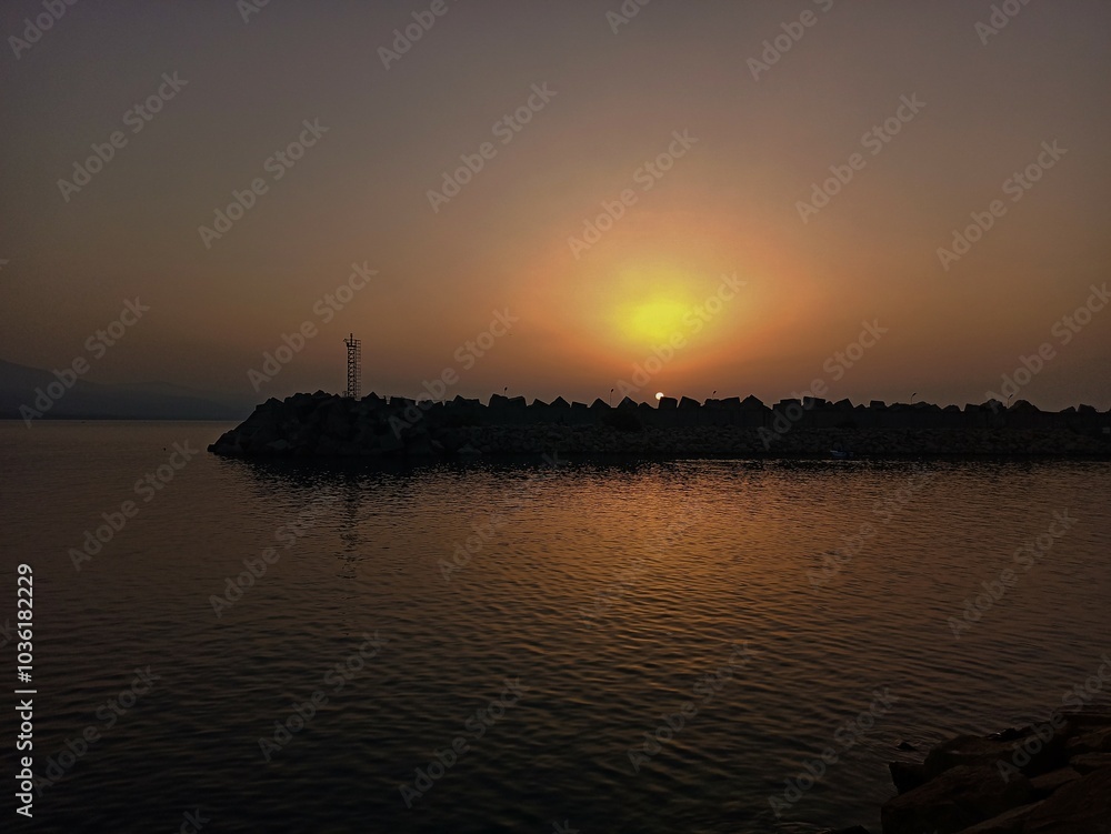 Naklejka premium sunset over the sea