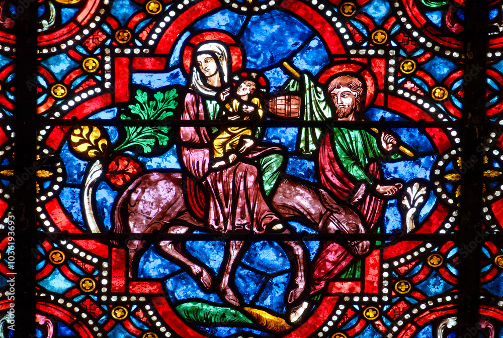 2024-10-16, Auxerre, FRANCE. Stained glass (17th century) of Holy Family: The Escape to Egypt. 2024-10-16, Auxerre, FRANCE. Stained glass (17th century) of Holy Family: The Escape to Egypt.
