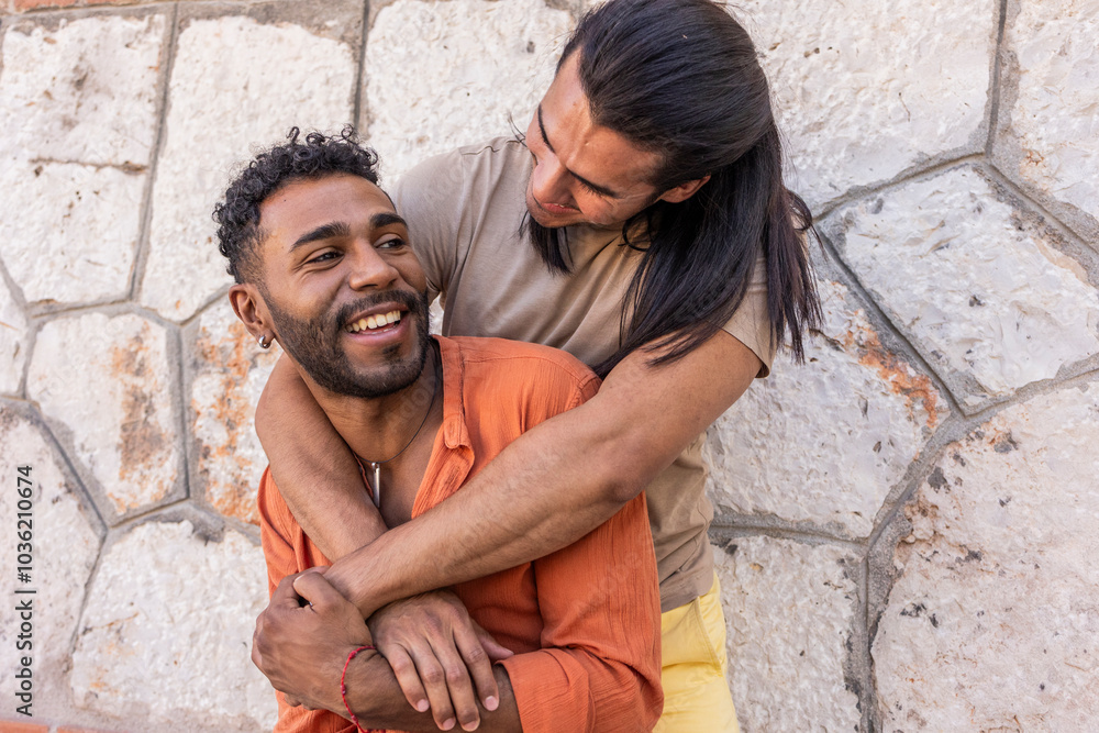 Gay couple embracing joyfully in a city setting Gay couple embracing joyfully in a city setting