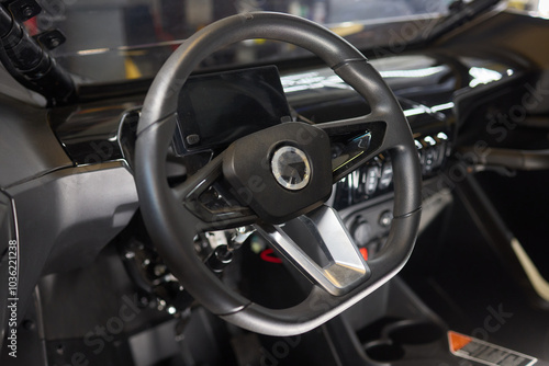 Modern Automotive Interior Design Features a Sleek and Stylish Steering Wheel Design