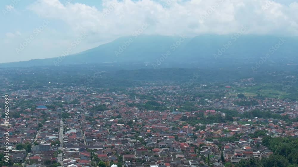 Aerial Views of A City on the Foot of Mountain in Tropical Country Aerial Views of A City on the Foot of Mountain in Tropical Country
