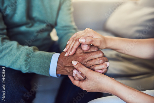 Senior person, compassion and support with holding hands, assistance and grief in nursing home. Elderly man, hope and bonding for empathy in living room for love, care and communication in retirement