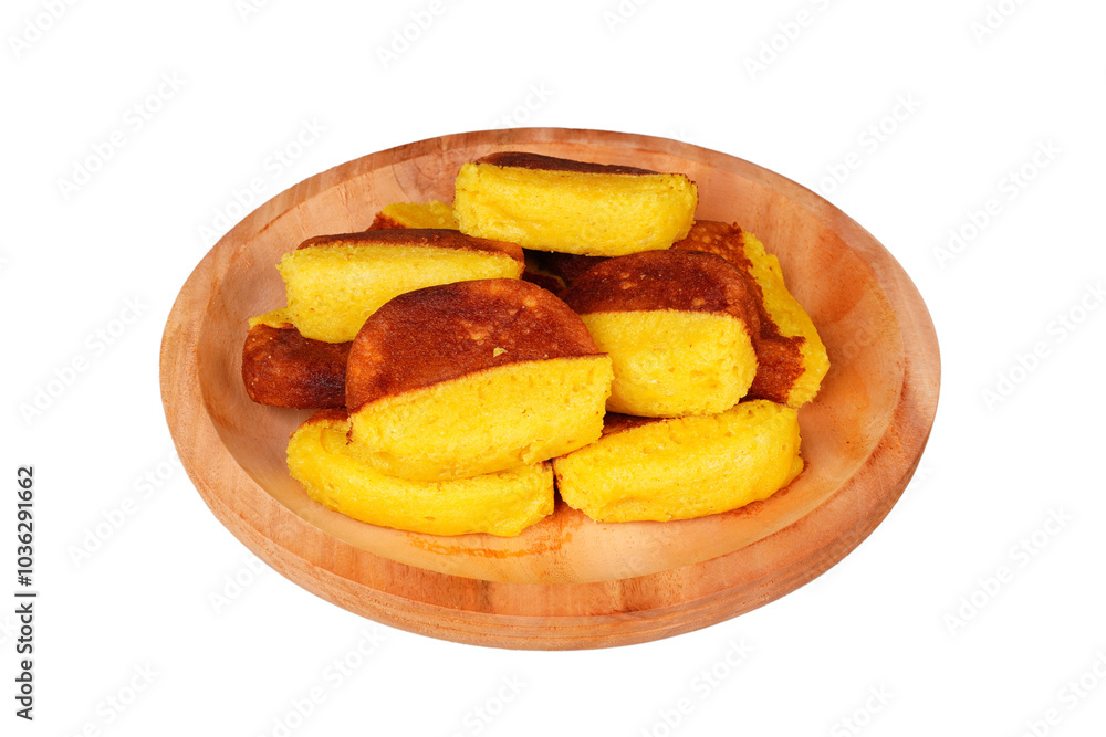 Stacked kue pukis on a wooden plate isolated transparent Stacked kue pukis on a wooden plate isolated transparent