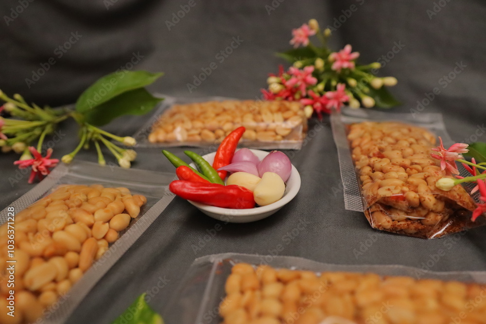 Nuts and spices chili and onion on black background for product, educational and other purposes Nuts and spices chili and onion on black background for product, educational and other purposes