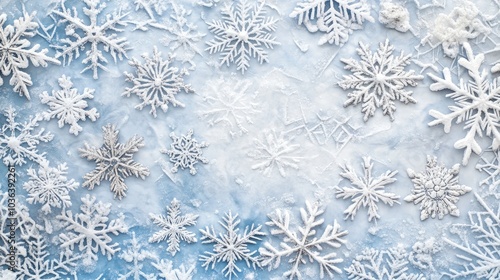 Winter wonderland snowflake background featuring various intricate snowflake designs on a frosty white and blue backdrop. photo