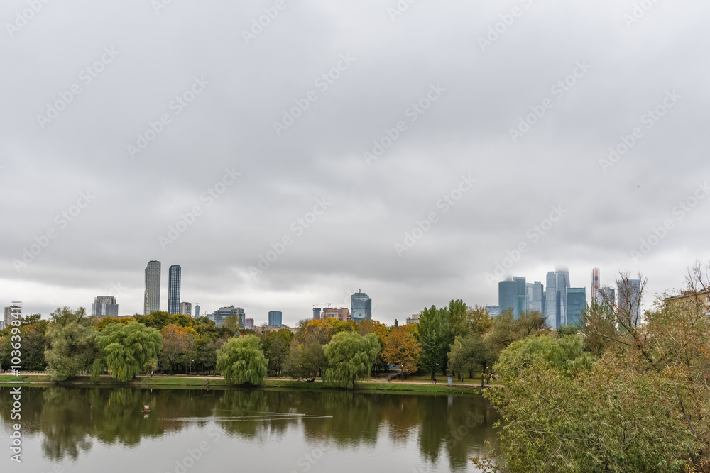Autumn view of the pond at the Novodevichy Convent and the skyscrapers of Moscow City. Autumn view of the pond at the Novodevichy Convent and the skyscrapers of Moscow City.