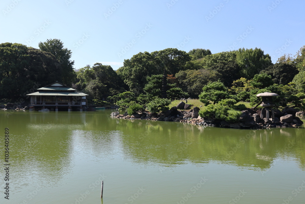 Ryotei House and Dai-Sensui Pond in Kiyosumi Garden, Tokyo, Japan Ryotei House and Dai-Sensui Pond in Kiyosumi Garden, Tokyo, Japan
