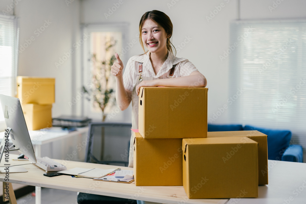 Young entrepreneur manages her online store from a home office, radiating confidence and pride among cardboard boxes, ensuring smooth shipping for customers Young entrepreneur manages her online store from a home office, radiating confidence and pride among cardboard boxes, ensuring smooth shipping for customers