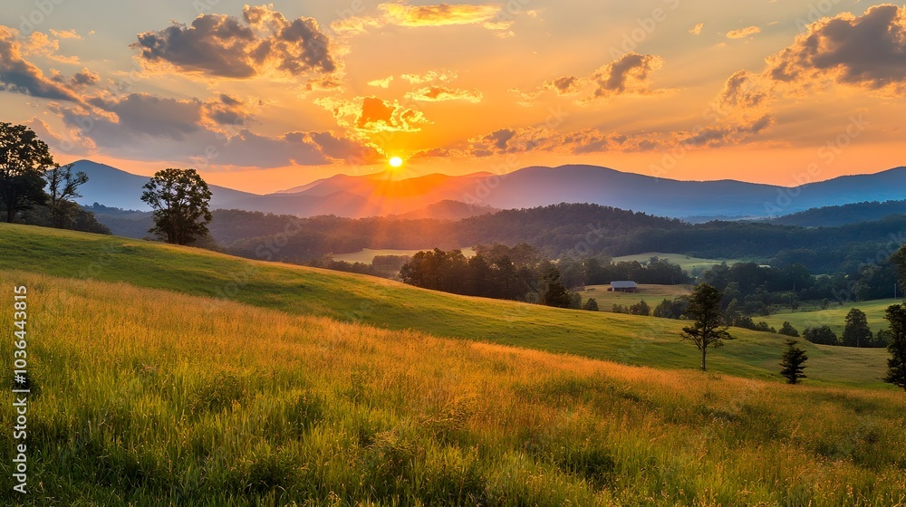 Obraz premium Breathtaking Sunset Over Serene Rural Countryside Landscape with Mountainous Horizon