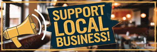 Support Local Business message in bold yellow letters on a restaurant background, with megaphone graphic. Blurred seating and dim lighting create a focus on the advocacy message, urging community  photo