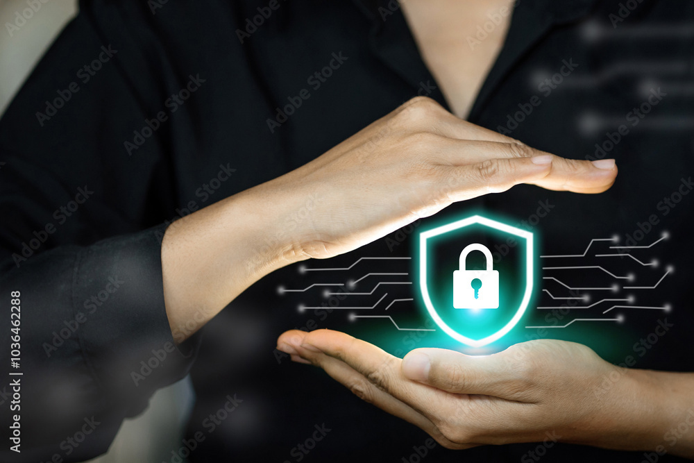 A woman is holding a green and blue image of a lock and key A woman is holding a green and blue image of a lock and key