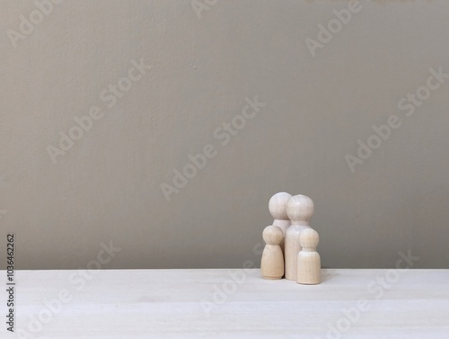 family of wooden dolls with copy space. concept of family