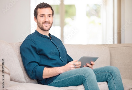 Portrait, house and man on sofa, tablet and smile with internet, digital app and relax in living room. Face, person and guy on couch, tech and connection with happiness, online news and social media