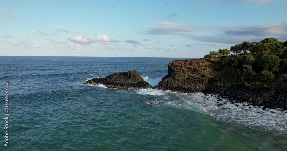 Aerial views of Fingal Head Lighthouse with the causeway rock formations below in Fingal Head, New South Wales, Australia Aerial views of Fingal Head Lighthouse with the causeway rock formations below in Fingal Head, New South Wales, Australia