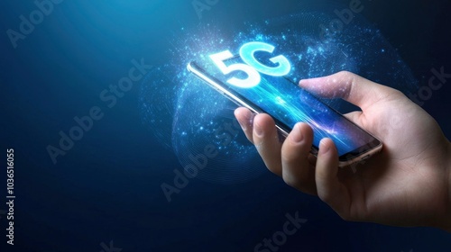 Wallpaper Mural A hand holding a smartphone with a digital data connection and text 5G, blue background Torontodigital.ca