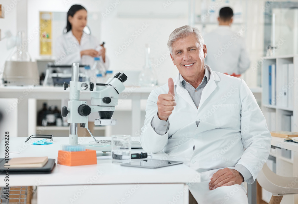 Laboratory, thumbs up and portrait of mature man with confidence, smile and medical science. Healthcare, happy and scientist at office desk with agreement, like or study in pharmaceutical engineering Laboratory, thumbs up and portrait of mature man with confidence, smile and medical science. Healthcare, happy and scientist at office desk with agreement, like or study in pharmaceutical engineering