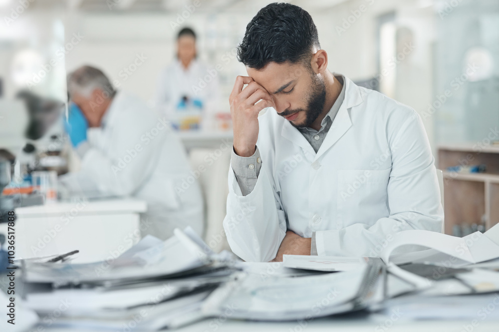 Science, stress and man in laboratory with documents for medical analysis, research and study. Healthcare, biotechnology and scientist with paperwork for burnout, fatigue and frustrated at desk Science, stress and man in laboratory with documents for medical analysis, research and study. Healthcare, biotechnology and scientist with paperwork for burnout, fatigue and frustrated at desk
