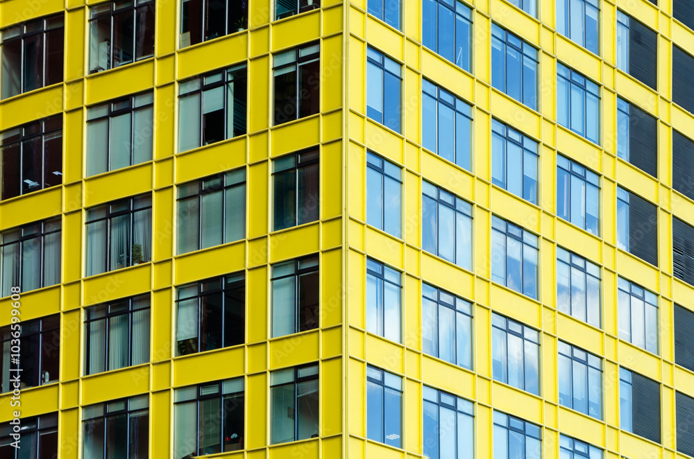 Corner of yellow building, geometric urban background Corner of yellow building, geometric urban background