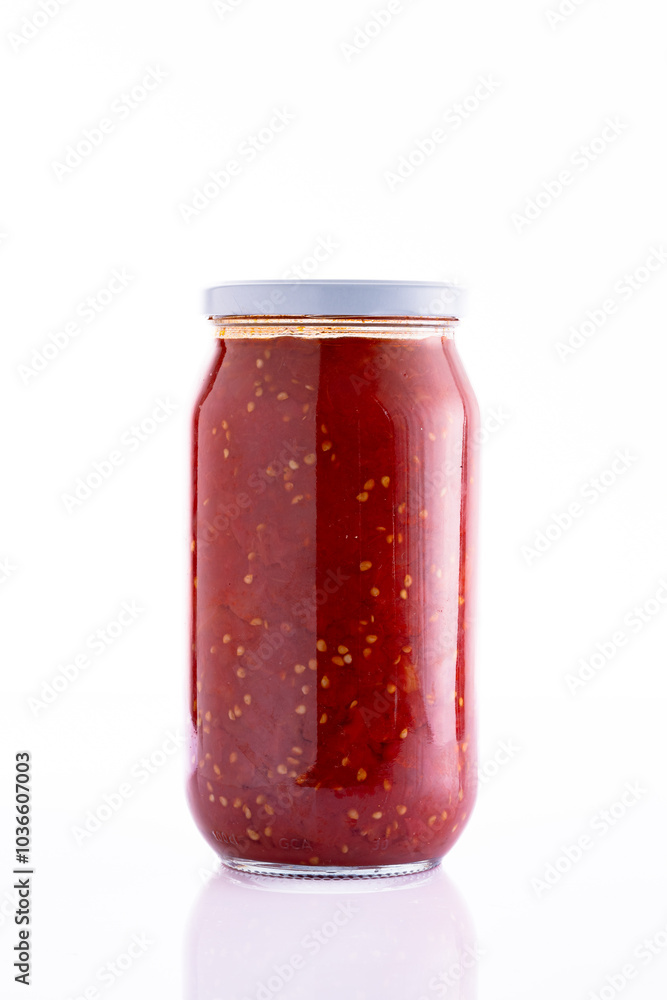 Traditional homemade canned tomatoes. Canned tomatoes prepared for winter meals Traditional homemade canned tomatoes. Canned tomatoes prepared for winter meals