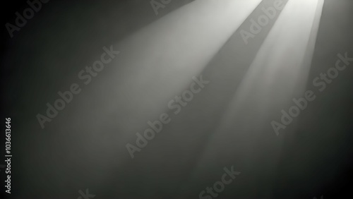 Abstract light beams radiating from the top of the frame against a dark grey background.