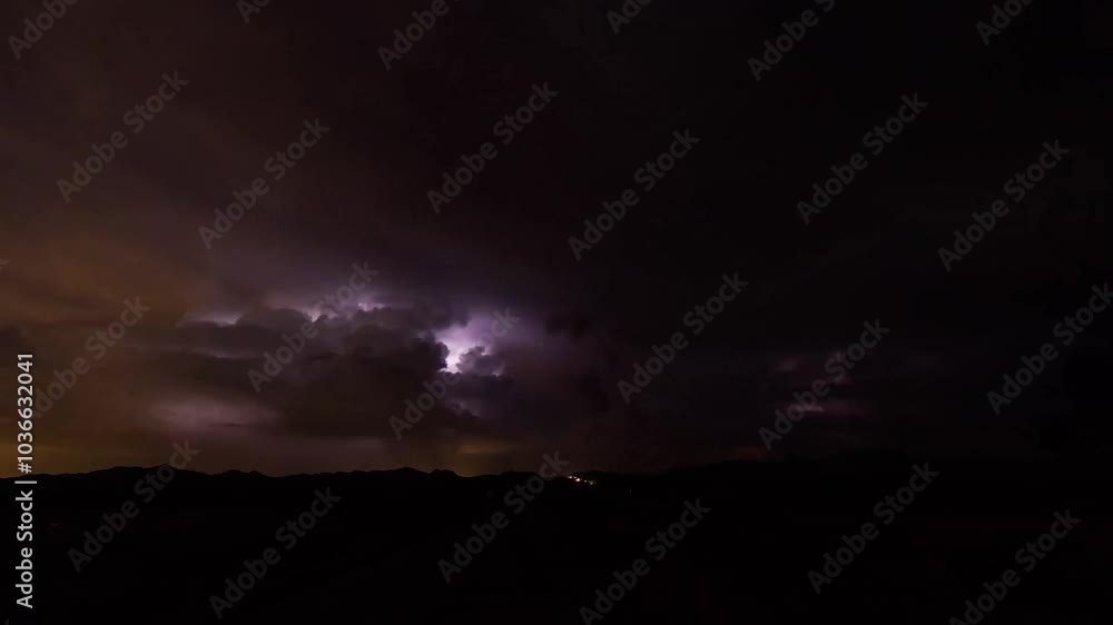 4K Time lapse, Spectacular thunderstorm lightning strikes dark night red shine at sunset 4K Time lapse, Spectacular thunderstorm lightning strikes dark night red shine at sunset