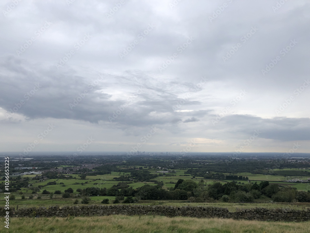View of Manchester from the Peak District, England View of Manchester from the Peak District, England