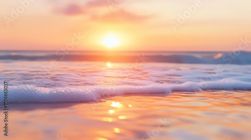 Serene ocean waves and golden sunset horizon evoke tranquility and natural beauty.