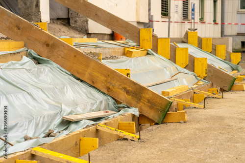 View of the construction and repair of steps near the building