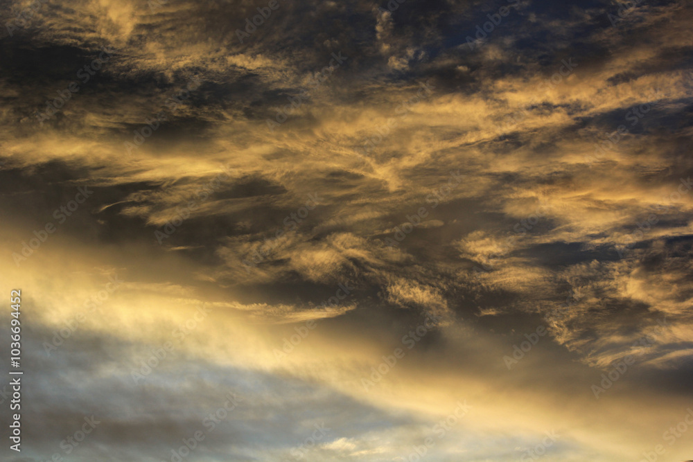 sunset with clouds over the village in india sunset with clouds over the village in india
