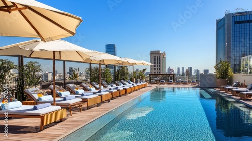 Wallpaper Mural A bright rooftop poolside scene with loungers, parasols, and panoramic views of nearby towers Torontodigital.ca