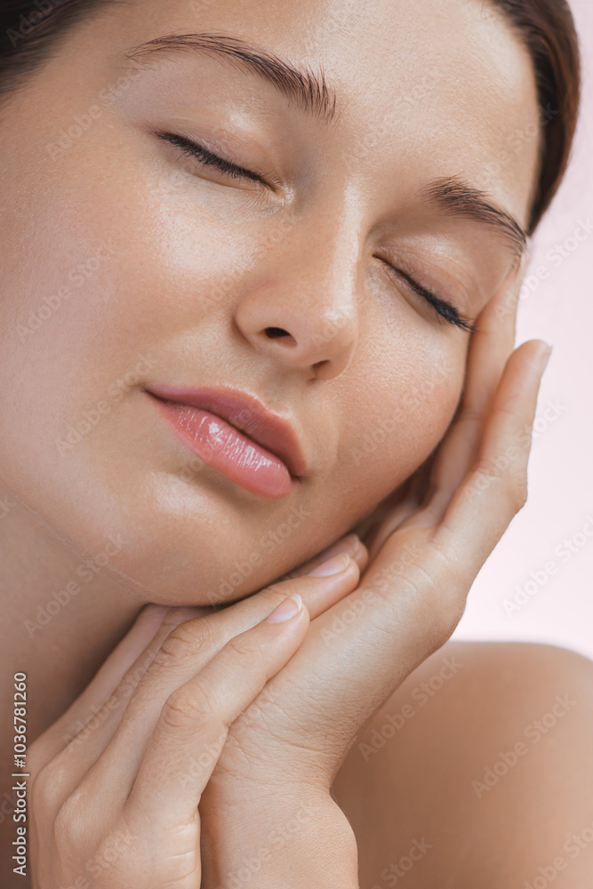 Close-up of a serene young woman with flawless, smooth skin, eyes closed, gently touching her face. Ideal for beauty, skincare, wellness, and self-care concepts, suitable for advertisements or Close-up of a serene young woman with flawless, smooth skin, eyes closed, gently touching her face. Ideal for beauty, skincare, wellness, and self-care concepts, suitable for advertisements or