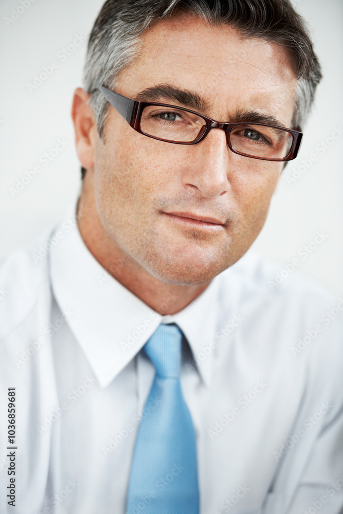 Portrait, glasses and serious business man, politician or government official. Face, eyewear and confident professional, manager and mature director with experience on white studio background in UK Portrait, glasses and serious business man, politician or government official. Face, eyewear and confident professional, manager and mature director with experience on white studio background in UK