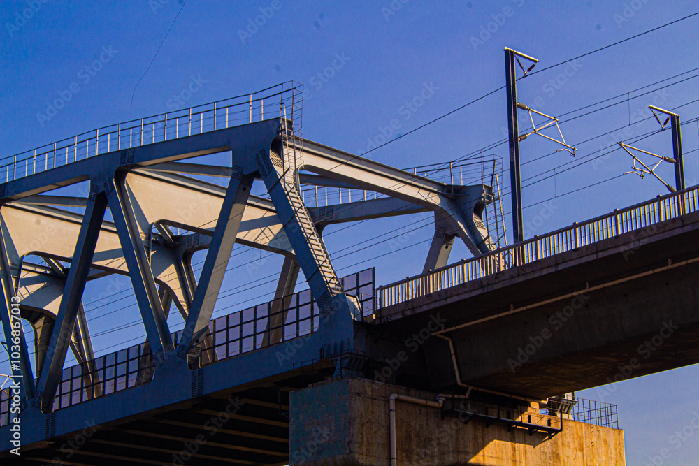 Obraz premium Whoosh High-Speed Rail Bridge in Indonesia Bathed in Sunlight