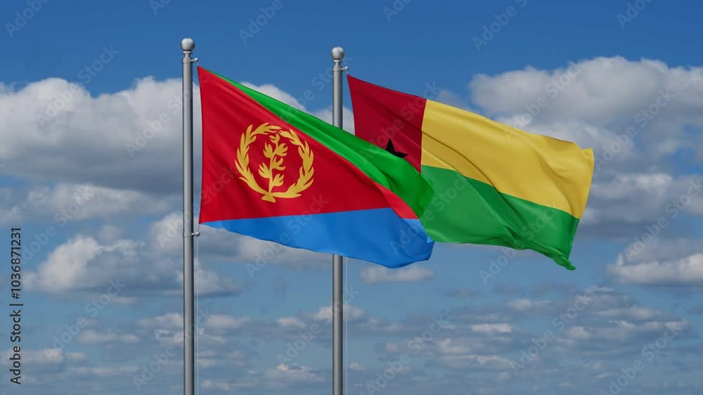 Guinea-Bissau and Eritrea flags flying together, video concept of the relationship, two country relations concept Guinea-Bissau and Eritrea flags flying together, video concept of the relationship, two country relations concept