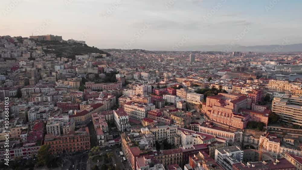 Aerial view of Naples, Italy at sunset. Soft orange light and blue sky Aerial view of Naples, Italy at sunset. Soft orange light and blue sky