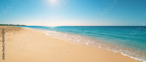 Peaceful Beach with White Sand and Vibrant Turquoise Waters Enhanced by Sunlight
