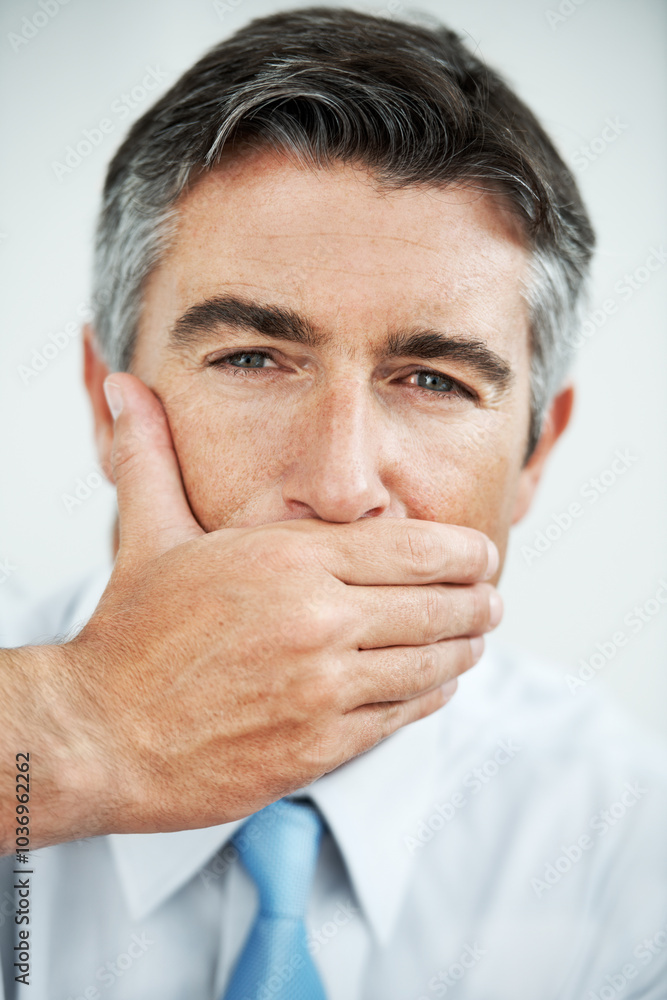 Business man, portrait and cover mouth in office for company secret, confidential information and censored. Mature employee, face and silence for corporate espionage, insider trading and extortion Business man, portrait and cover mouth in office for company secret, confidential information and censored. Mature employee, face and silence for corporate espionage, insider trading and extortion