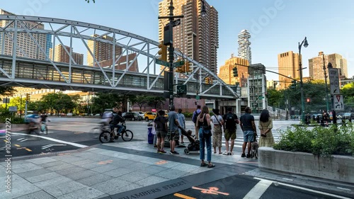 New York City - USA - Aug 13 2024: Zoom in peak hour traffic at intersection of Hudson River Greenway and Chambers Street in Tribeca Lower Manhattan