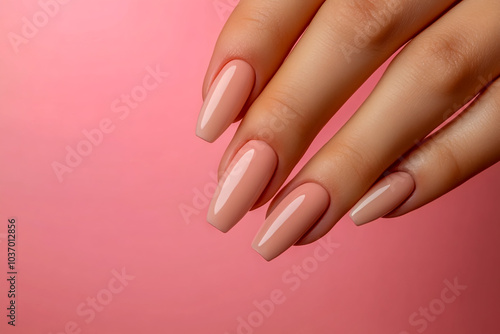 Wallpaper Mural Beautiful woman's hand with a perfect manicure on a pink background. Torontodigital.ca