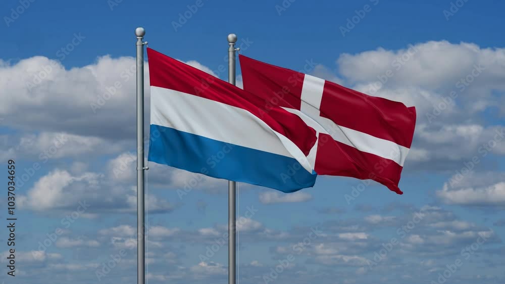 Denmark and Luxembourg flags flying together, video concept of the relationship, two country relations concept Denmark and Luxembourg flags flying together, video concept of the relationship, two country relations concept