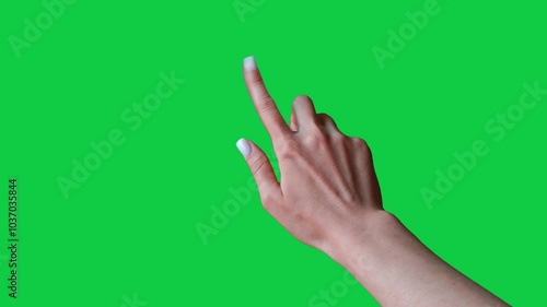 Swipe up gesture. Female hand scrolls left swiping on chroma key green screen background. Using a smartphone, tablet pc or a touchscreen. Interface concept. Swiping left and right and tap with finger